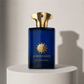 Amouage Interlude Man eau de parfum in deep blue glass bottle with gold cap – full-size bottle available at luxuryperfumesamples.com