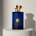 Amouage Interlude Man eau de parfum in deep blue glass bottle with gold cap – full-size bottle available at luxuryperfumesamples.com