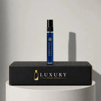 Amouage Interlude Man eau de parfum sample vial in deep blue glass, displayed on Luxury Perfume Samples branded box – sample decant available at luxuryperfumesamples.com
