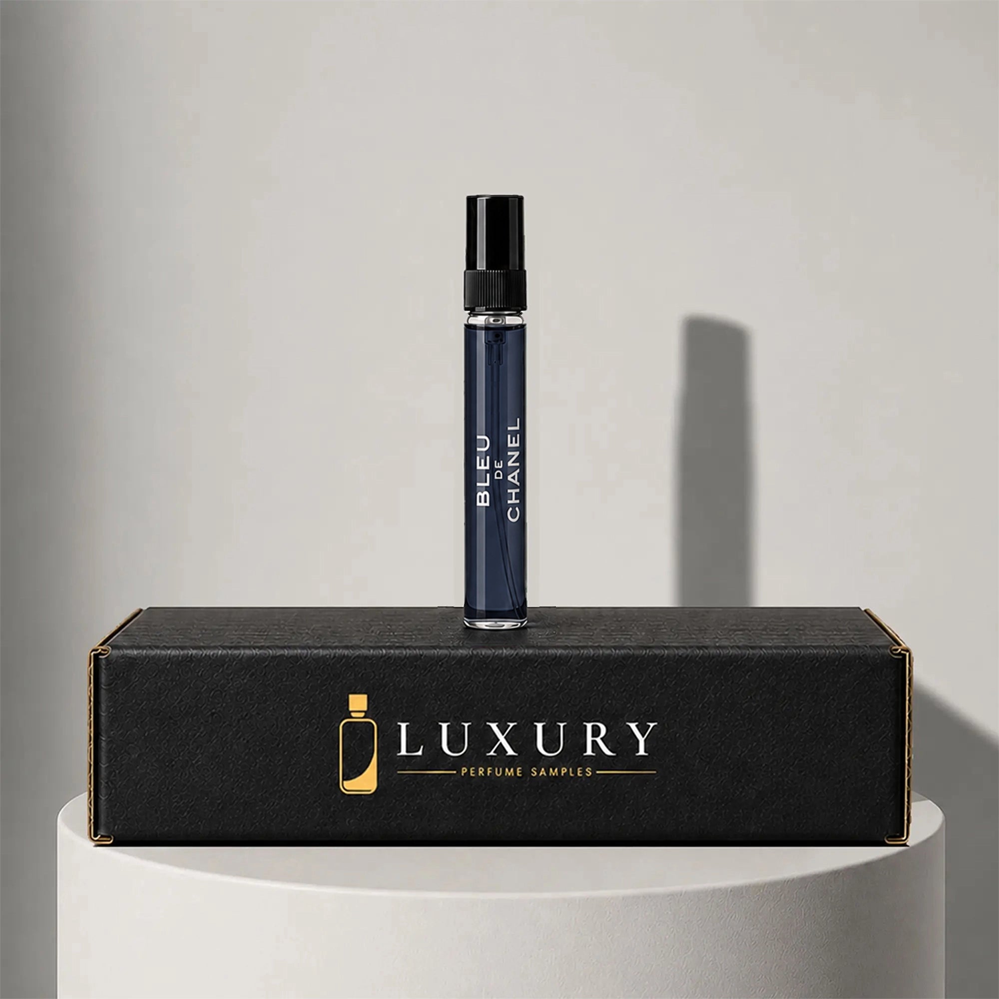 Chanel Bleu de Chanel eau de parfum sample vial, displayed on Luxury Perfume Samples branded box – sample decant available at luxuryperfumesamples.com