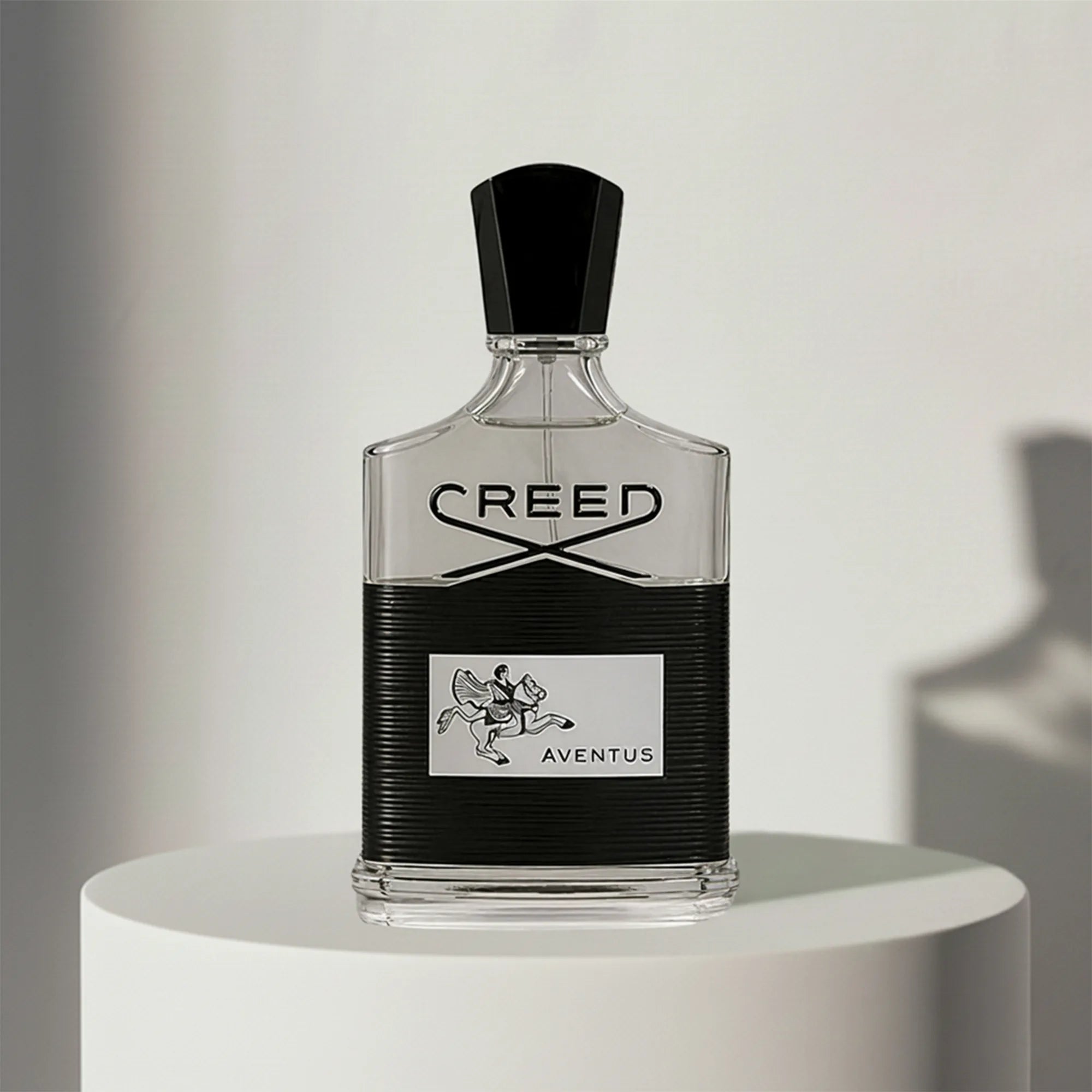 Creed Aventus eau de parfum in clear glass bottle with black cap – full-size bottle available at luxuryperfumesamples.com

