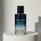 Dior Sauvage eau de parfum in blue ombré glass bottle with black ribbed cap – full-size bottle available at luxuryperfumesamples.com
