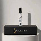 Escentric Molecules Molecule 01 eau de toilette sample vial, displayed on Luxury Perfume Samples branded box – sample decant available at luxuryperfumesamples.com