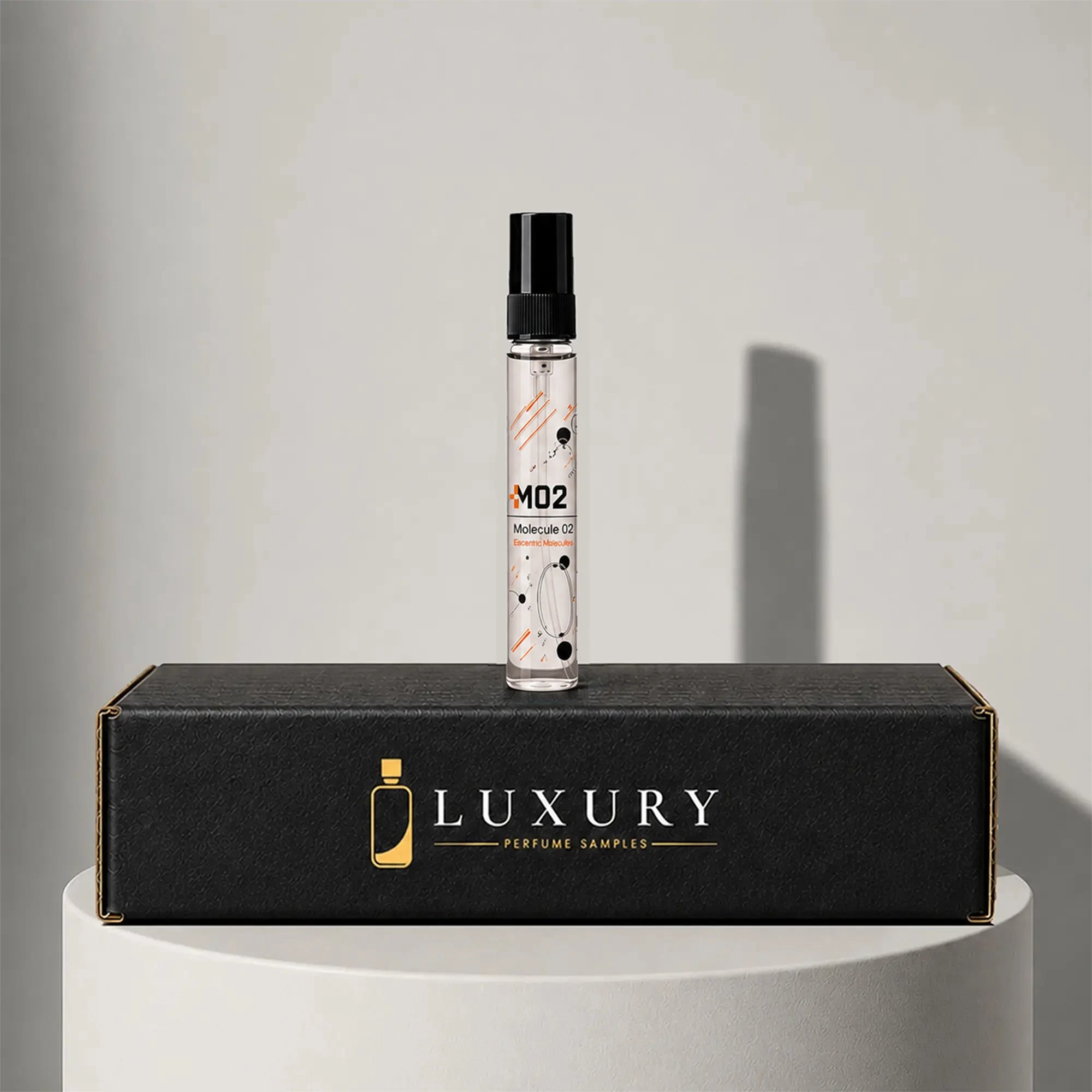 Escentric Molecules Molecule 02 eau de toilette sample vial, displayed on Luxury Perfume Samples branded box – sample decant available at luxuryperfumesamples.com