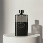 Gucci Guilty Pour Homme eau de toilette in black glass bottle with black cap – full-size bottle available at luxuryperfumesamples.com
