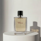 Hermès Terre d'Hermès eau de toilette in golden glass bottle with black cap – full-size bottle available at luxuryperfumesamples.com

