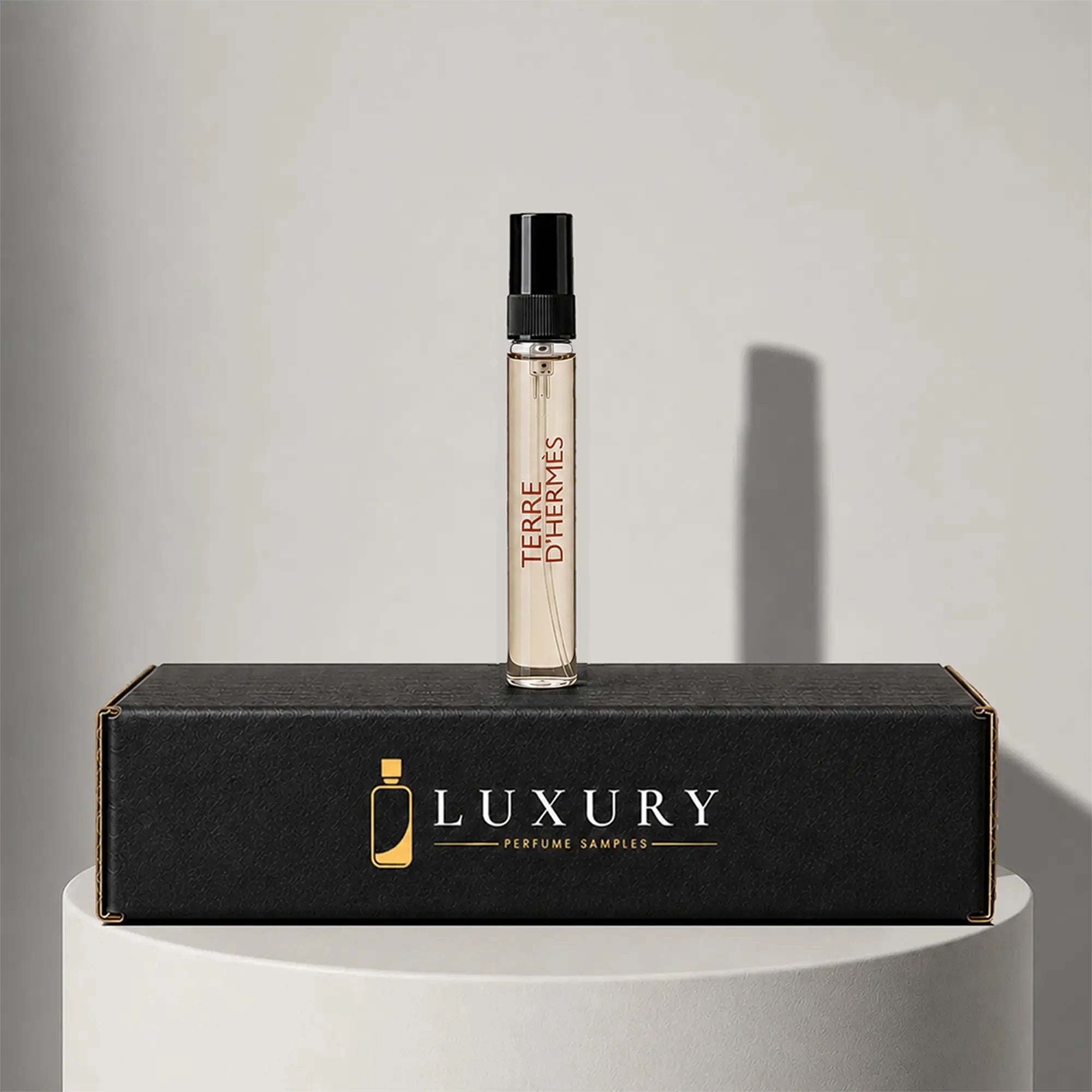 Hermès Terre d'Hermès eau de toilette sample vial, displayed on Luxury Perfume Samples branded box – sample decant available at luxuryperfumesamples.com