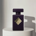 Initio Side Effect eau de parfum in deep purple glass bottle with gold diamond emblem – full-size bottle available at luxuryperfumesamples.com