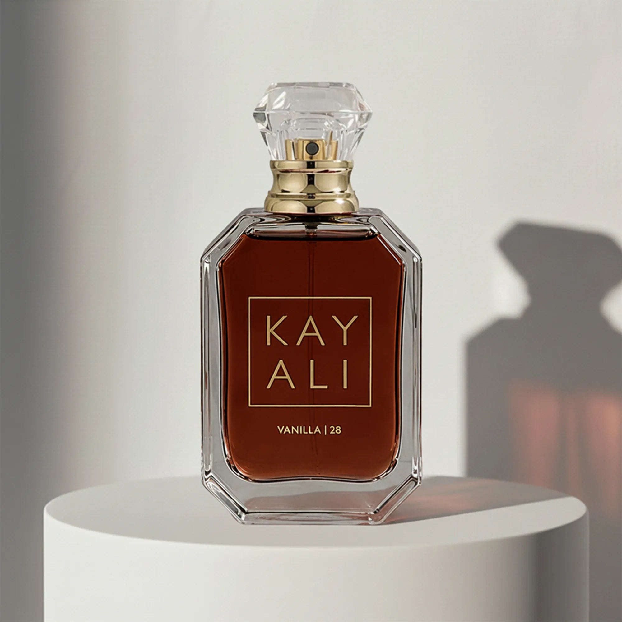 Kayali Vanilla 28 eau de parfum in amber glass bottle with crystal cap – full-size bottle available at luxuryperfumesamples.com
