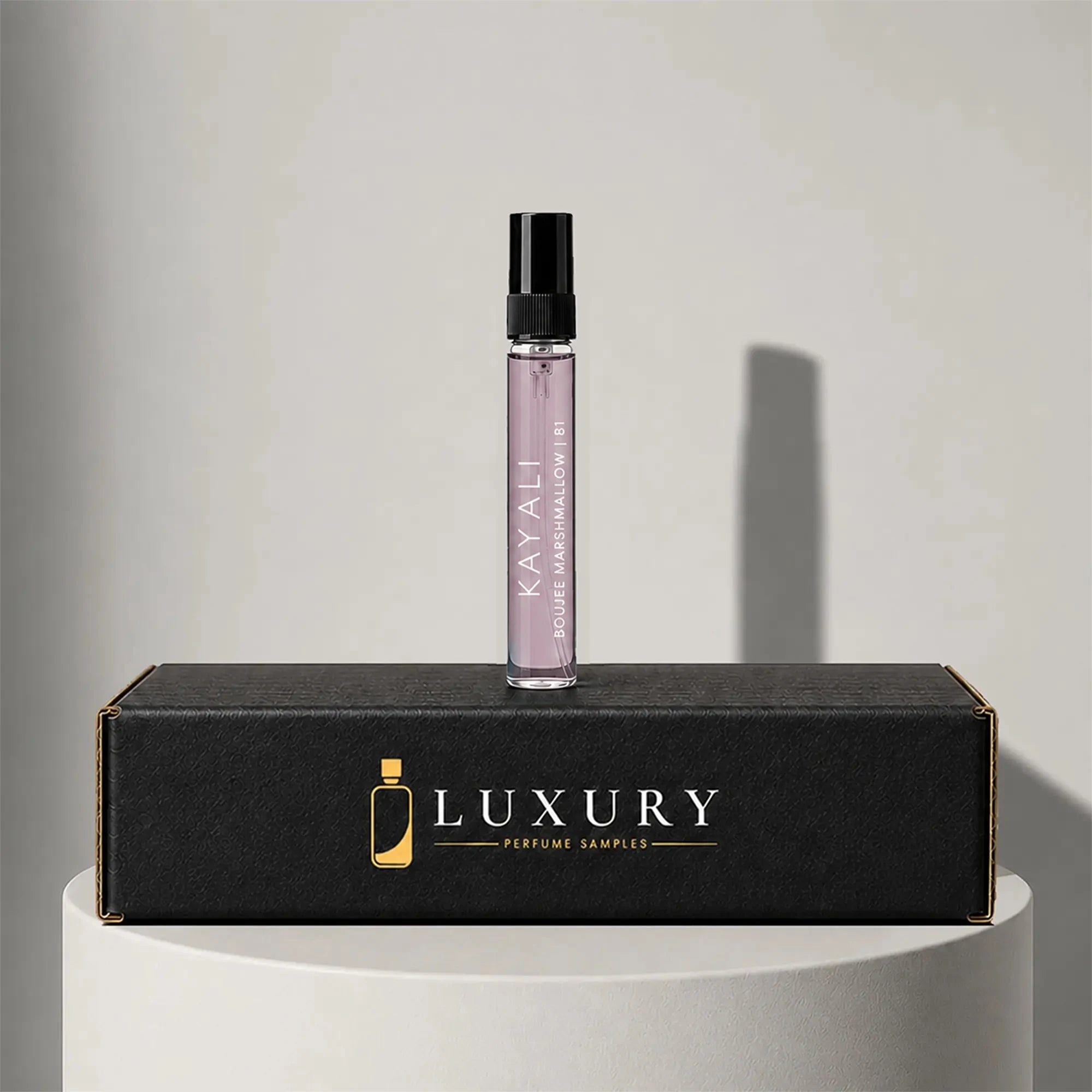 Kayali Yum Boujee Marshmallow 81  eau de parfum sample vial, displayed on Luxury Perfume Samples branded box – sample decant available at luxuryperfumesamples.com