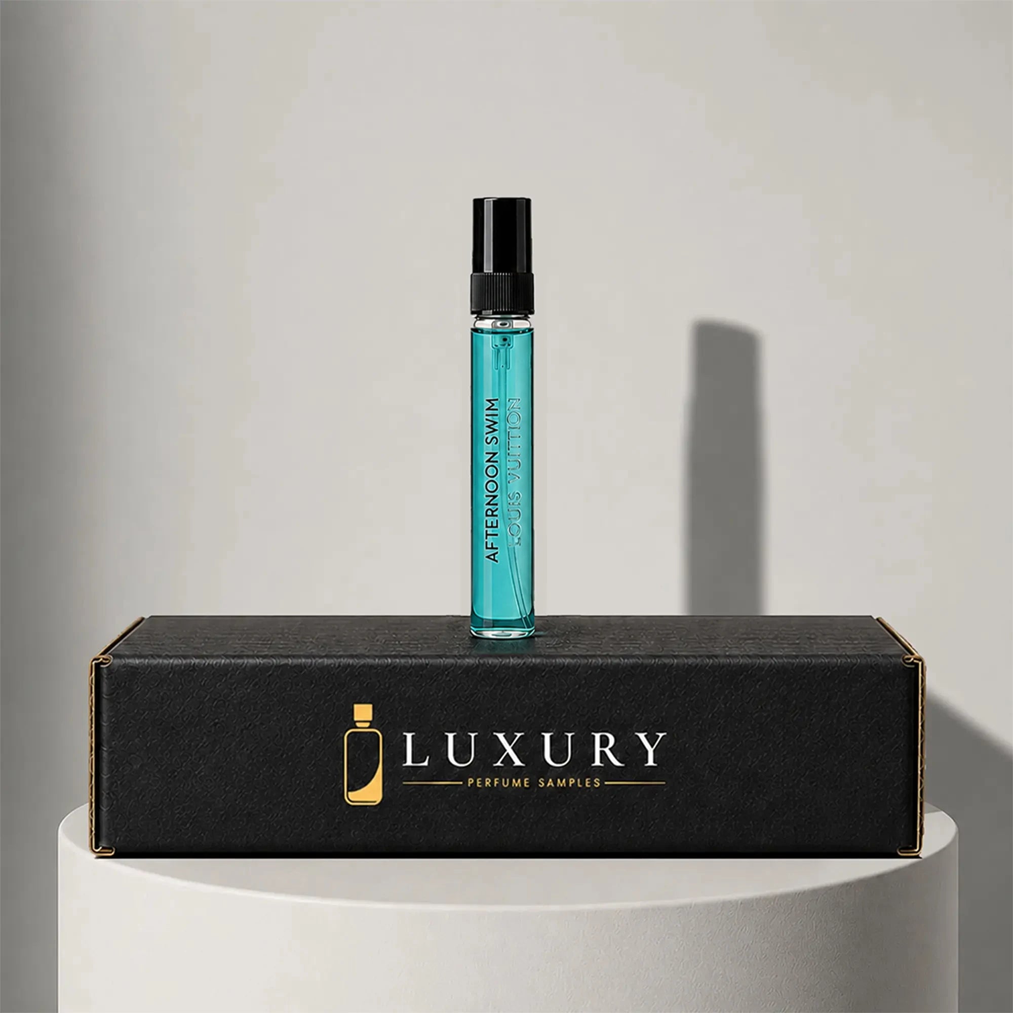 Louis Vuitton Afternoon Swim eau de toilette sample vial with black cap, displayed on Luxury Perfume Samples branded box – sample decant available at luxuryperfumesamples.com