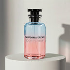 Louis Vuitton California Dream eau de parfum in blue-to-pink ombré glass bottle with black cap – full-size bottle available at luxuryperfumesamples.com

