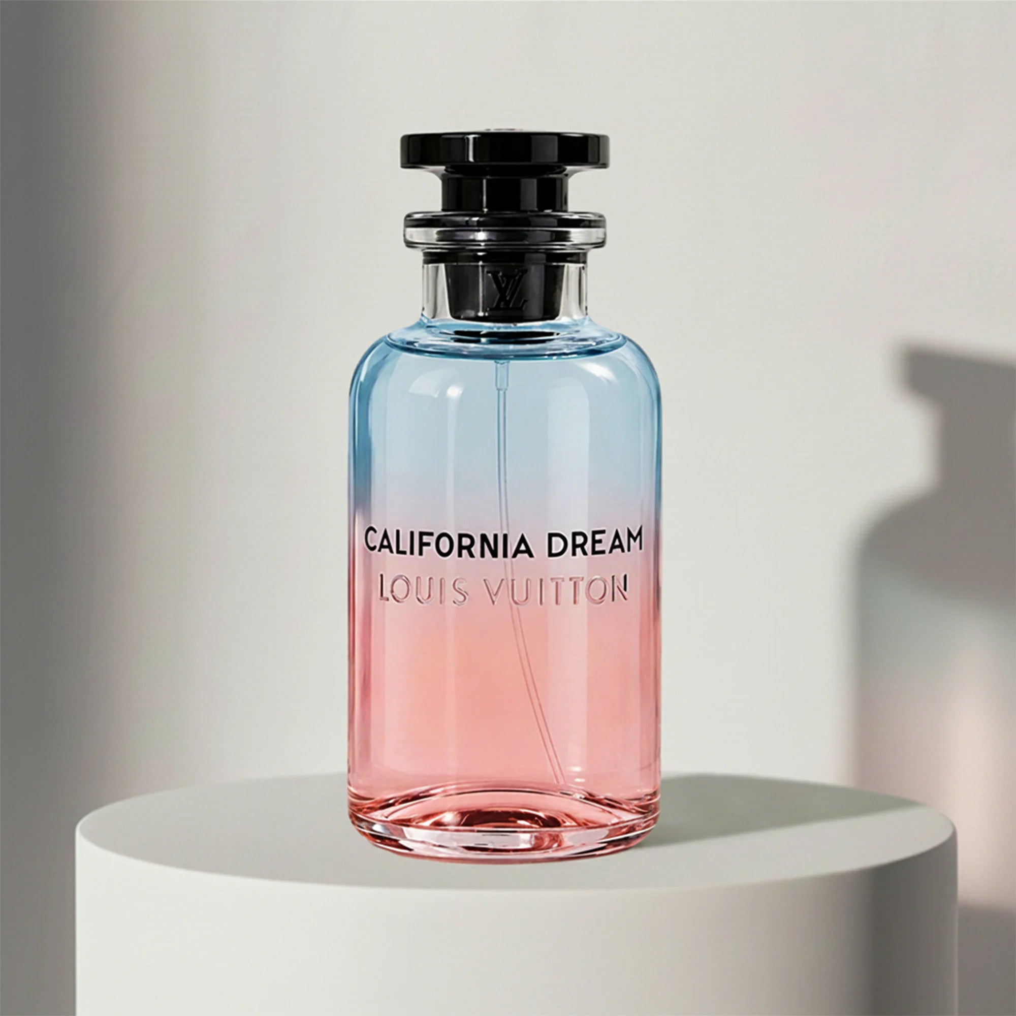 Louis Vuitton California Dream eau de parfum in blue-to-pink ombré glass bottle with black cap – full-size bottle available at luxuryperfumesamples.com
