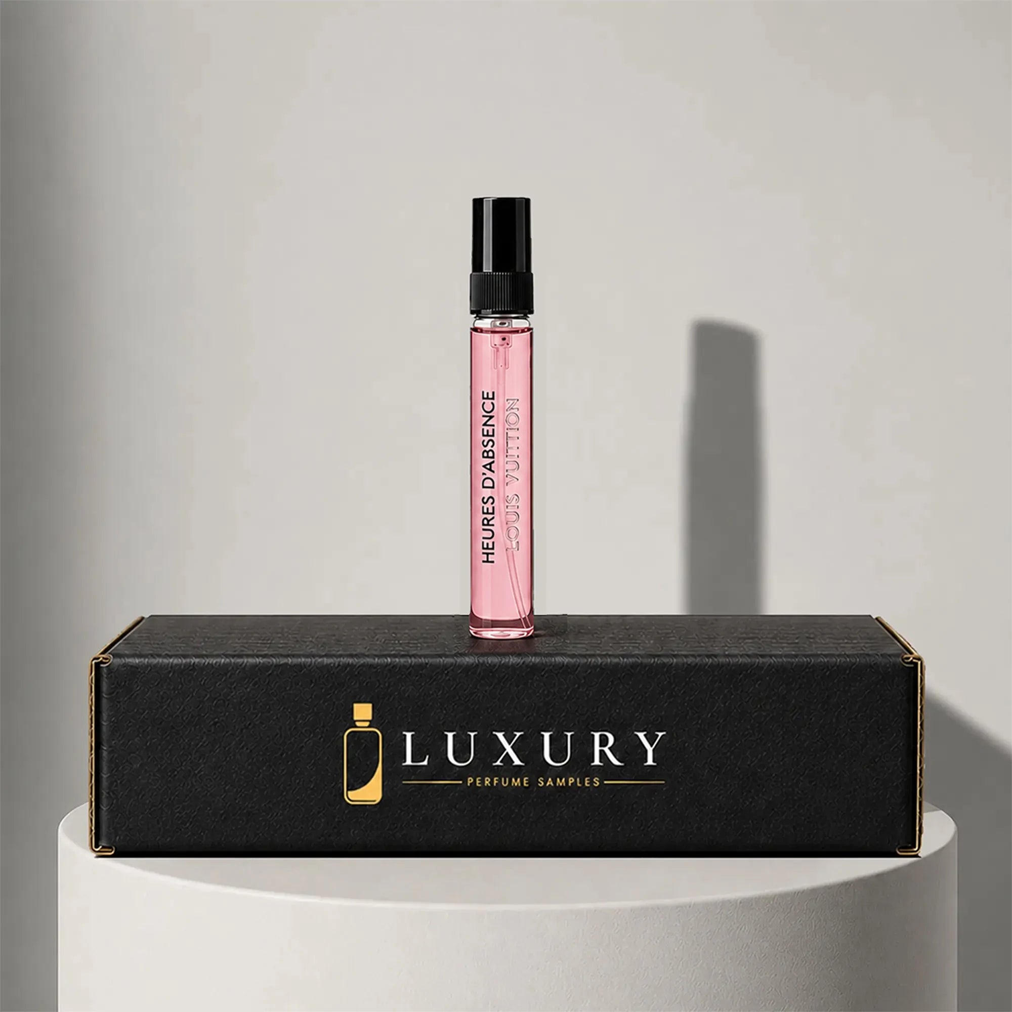 Louis Vuitton Heures d'Absence eau de parfum sample vial with black cap, displayed on Luxury Perfume Samples branded box – sample decant available at luxuryperfumesamples.com