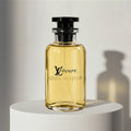Louis Vuitton LV Lovers eau de parfum in golden glass bottle with black cap – full-size bottle available at luxuryperfumesamples.com
