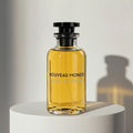 Louis Vuitton Nouveau Monde eau de parfum in golden amber glass bottle with black cap and stopper – full-size bottle available at luxuryperfumesamples.com