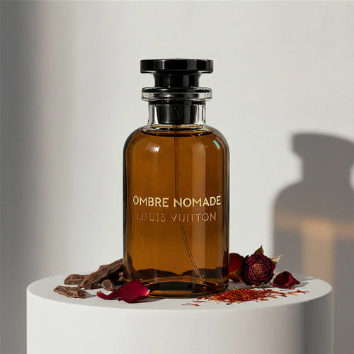 Louis Vuitton Ombre Nomade eau de parfum in signature amber glass bottle with black cap and stopper – full-size bottle available at luxuryperfumesamples.com