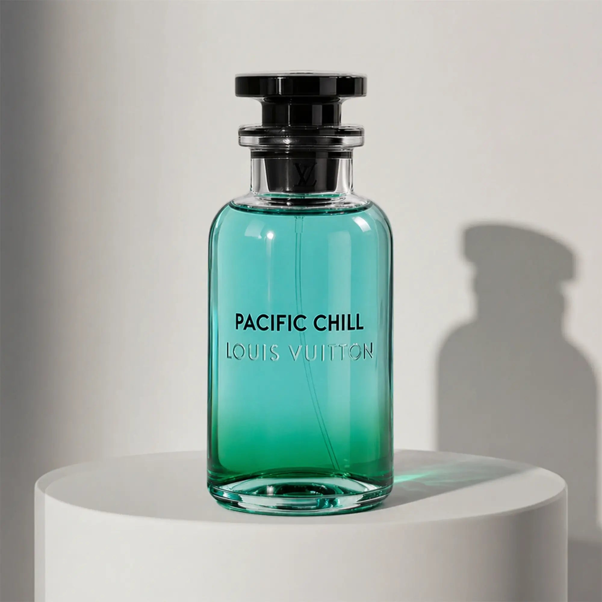 Louis Vuitton Pacific Chill eau de toilette in turquoise green glass bottle with black cap and stopper – full-size bottle available at luxuryperfumesamples.com