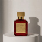 Maison Francis Kurkdjian Baccarat Rouge 540 extrait de parfum in deep red glass bottle with gold cap – full-size bottle available at luxuryperfumesamples.com