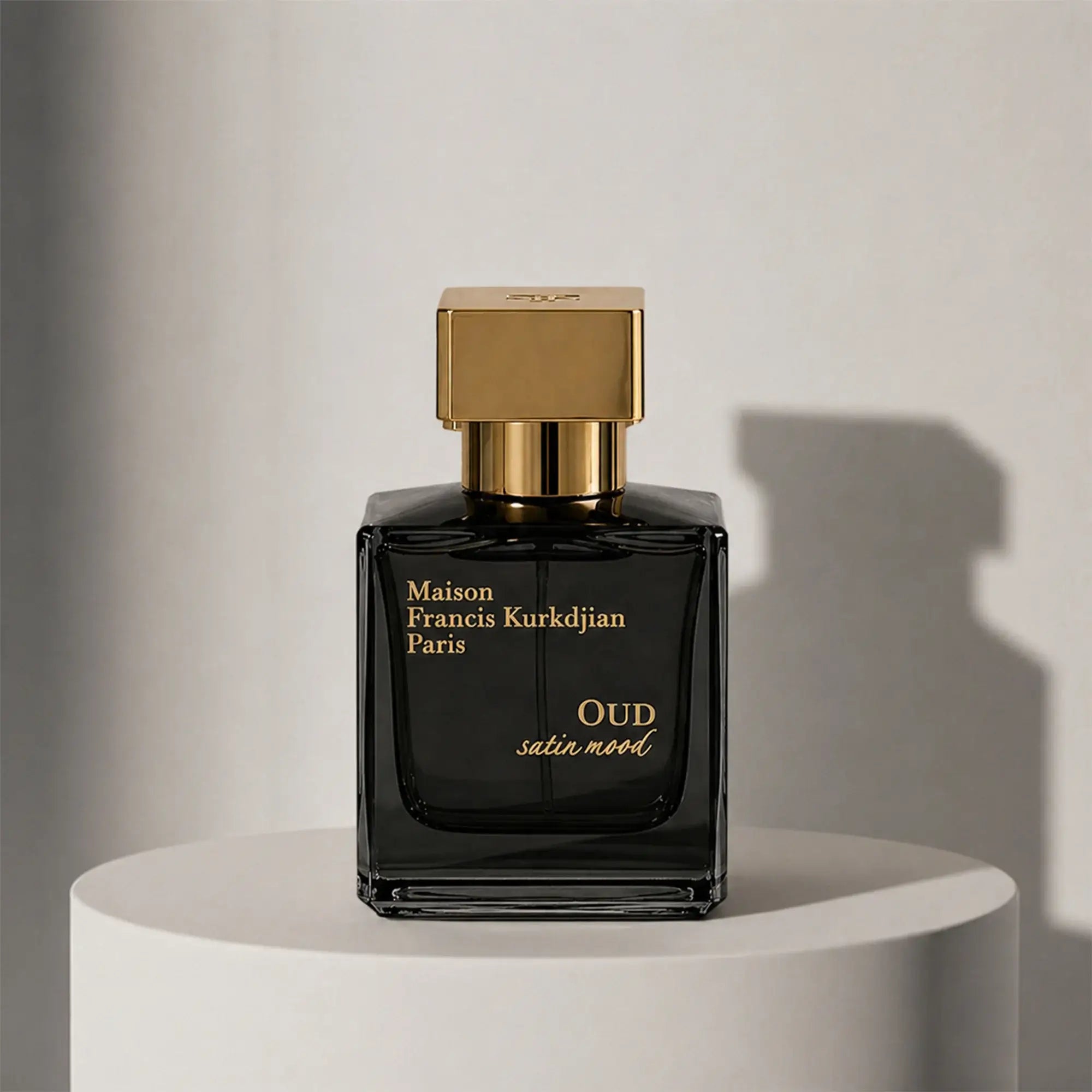 Maison Francis Kurkdjian Oud Satin Mood eau de parfum in black glass bottle with gold cap – full-size bottle available at luxuryperfumesamples.com