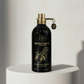 Montale Arabians Tonka eau de parfum in black glass bottle with gold cap and horse charm – full-size bottle available at luxuryperfumesamples.com

