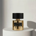 Tiziana Terenzi Kirke extrait de parfum in gold glass bottle with black cap – full-size bottle available at luxuryperfumesamples.com
