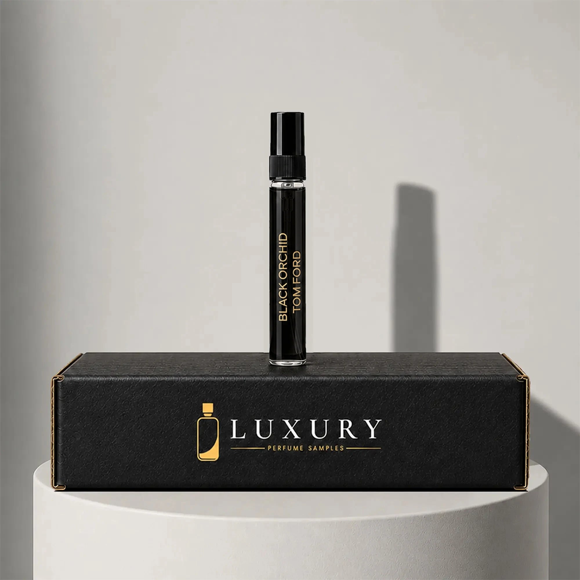 Tom Ford Black Orchid eau de parfum sample vial, displayed on Luxury Perfume Samples branded box – sample decant available at luxuryperfumesamples.com