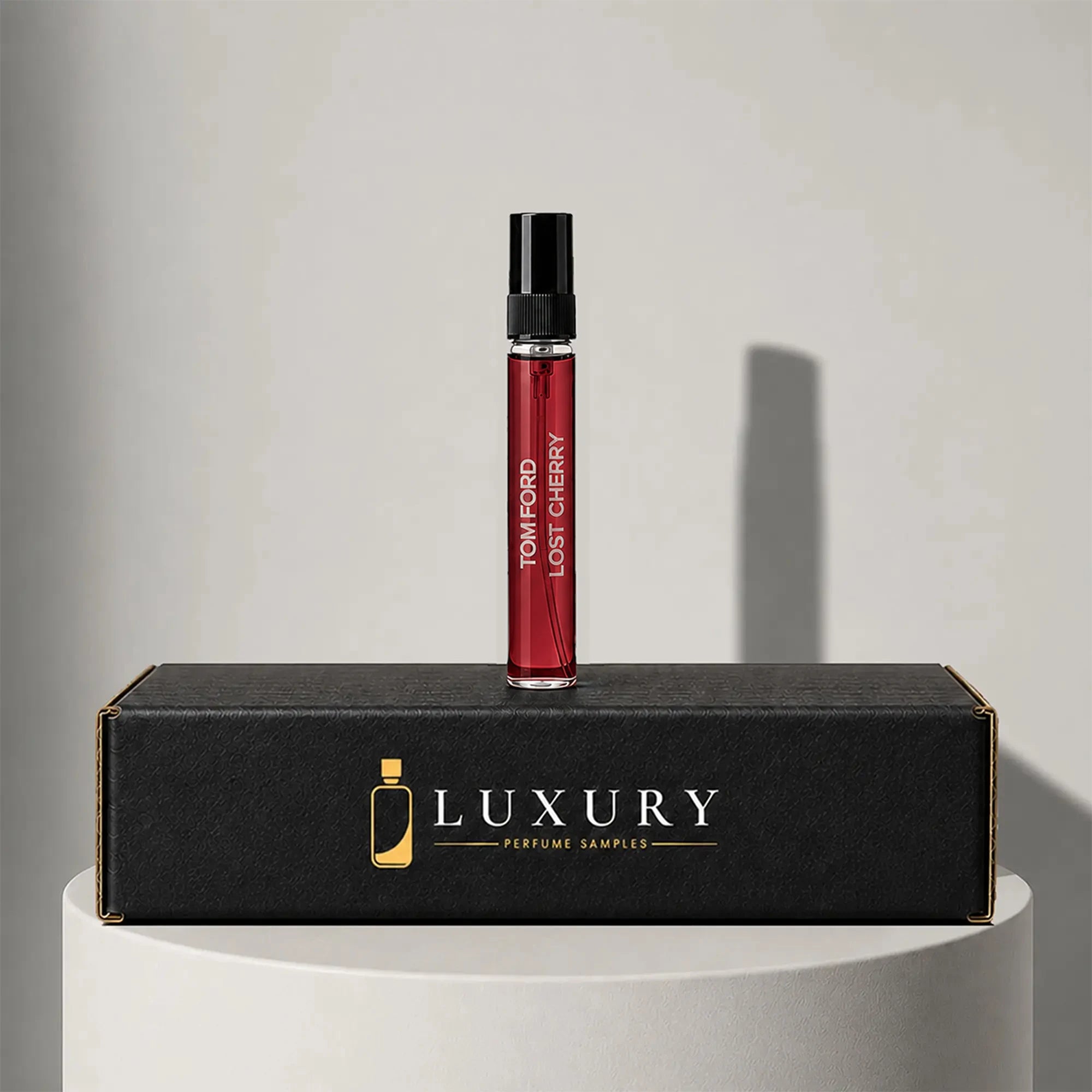 Tom Ford Lost Cherry eau de parfum sample vial with black cap, displayed on Luxury Perfume Samples branded box – sample decant available at luxuryperfumesamples.com