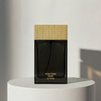 Tom Ford Noir Extreme eau de parfum in black glass bottle with ribbed gold cap – full-size bottle available at luxuryperfumesamples.com
