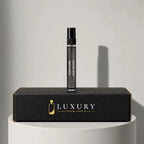 Tom Ford Oud Wood eau de parfum sample vial with black cap, displayed on Luxury Perfume Samples branded box – sample decant available at luxuryperfumesamples.com