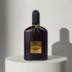 Tom Ford Velvet Orchid eau de parfum in deep purple ribbed glass bottle with gold cap – full-size bottle available at luxuryperfumesamples.com
