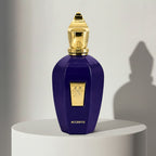 Xerjoff Accento eau de parfum in deep purple glass bottle with gold cap – full-size bottle available at luxuryperfumesamples.com
