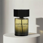 Yves Saint Laurent La Nuit de l'Homme eau de toilette in amber glass bottle with black cap – full-size bottle available at luxuryperfumesamples.com
