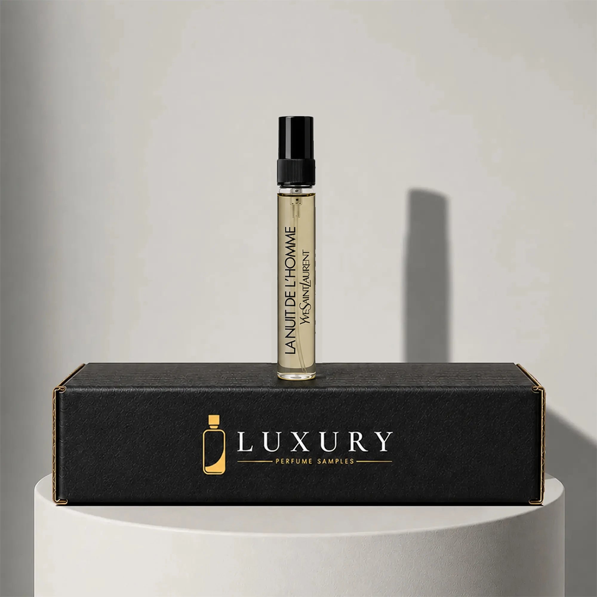 Yves Saint Laurent La Nuit de l'Homme eau de toilette sample vial, displayed on Luxury Perfume Samples branded box – sample decant available at luxuryperfumesamples.com